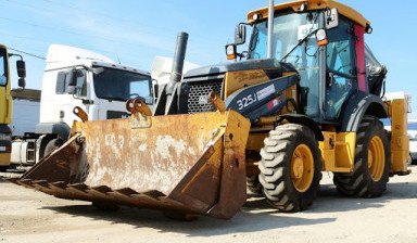 Аренда экскаватора-погрузчика john-deere
