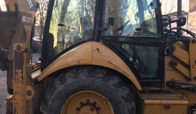 Аренда экскватора - погрузчика. Планировка. caterpillar