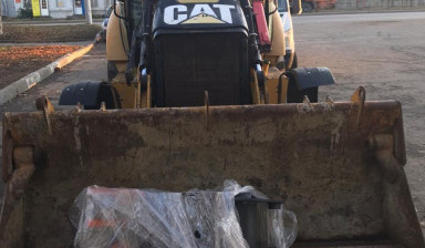 Аренда экскватора - погрузчика. Планировка. caterpillar