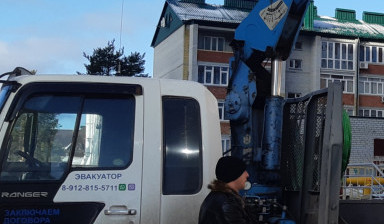 Эвакуатор-манипулятор услуги по перевозкам.