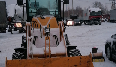 Аренда фронтального погрузчика с машинистом.