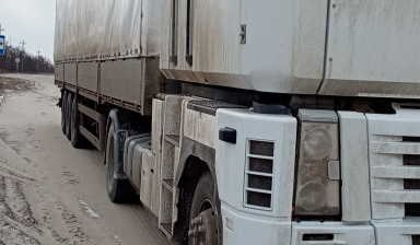 Грузоперевозки на тентованном длинномере.