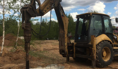 Аренда ямобура JCB. Шнековое бурение.