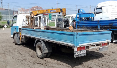 Услуги манипулятора с текстильными стропами.