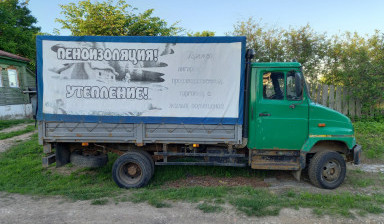 Грузоперевозки, переезды. Грузовик с тентом.