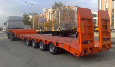 Трал перевозка грузов и спецтехники в Калининграде