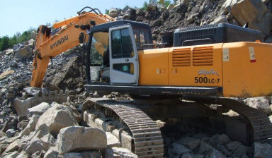 Услуги экскаватора HUYNDAI R500