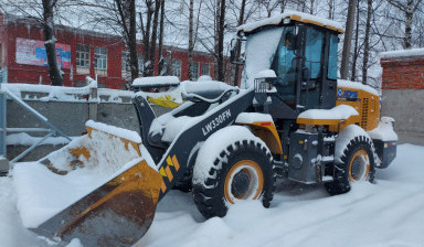 Уборка и вывоз снега трактором