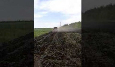 Дискование земли (обработка почвы) Claas Xerion